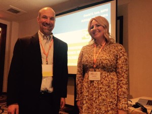 David Lee and Ashleigh Klein presenting at ATIXA/SCOPE conference in front of screen