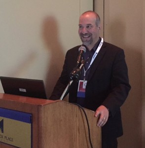 David Lee at podium at APHA conference