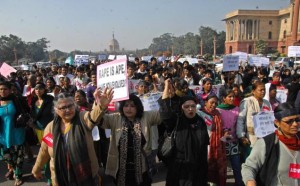 Students and various women organizations stage a protest march against the gang rape of 23-year-old student.