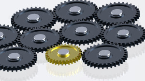 steel-gears-in-connection-with-gold-one-concept-for-teamwork-and-business